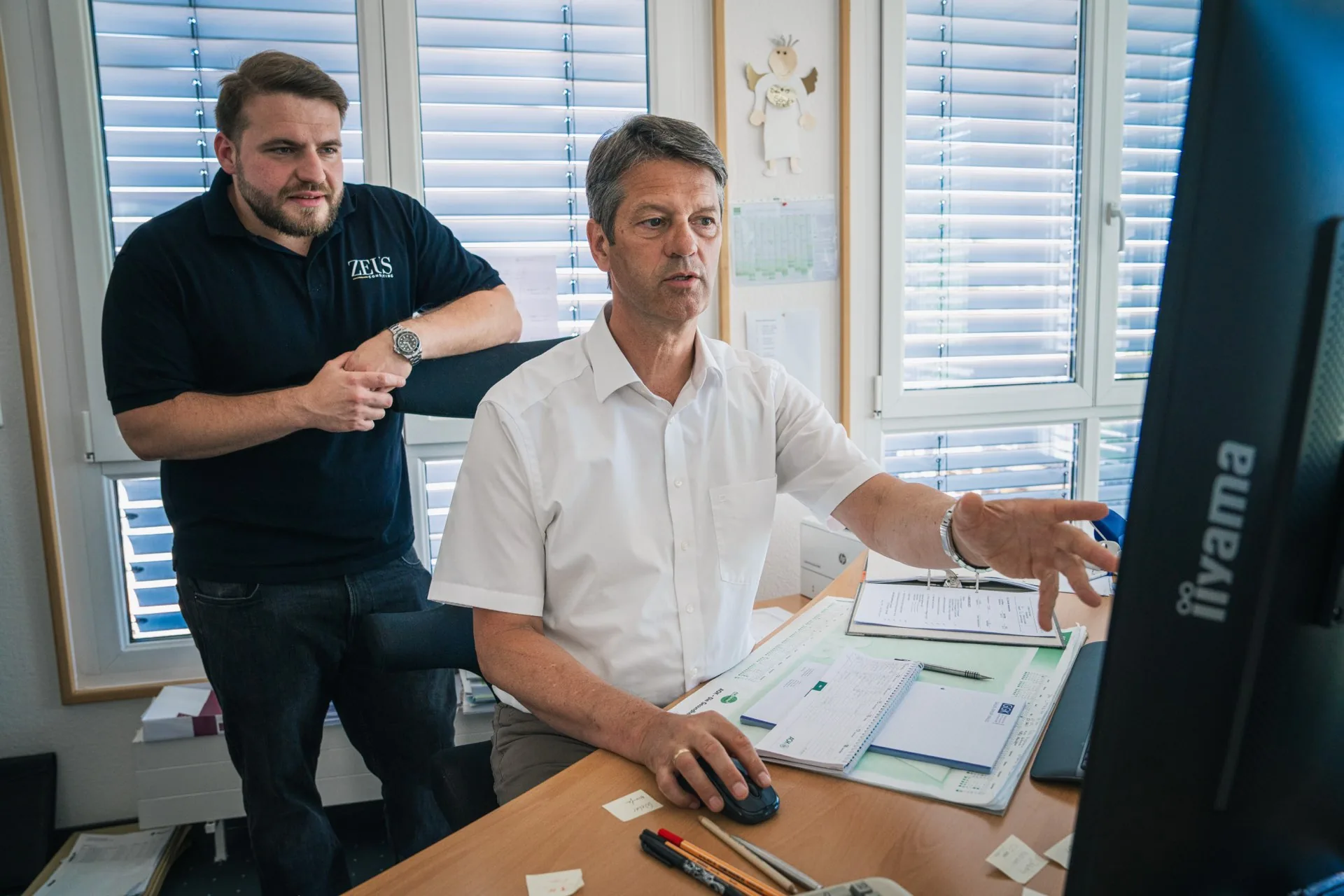 Zeus-Consulting-Berater bei GGK vor Ort am Arbeitsplatz